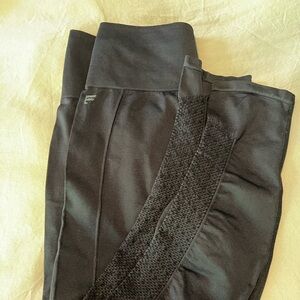 Fabletics black leggings open scroll work sides